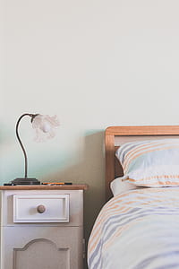 desk lamp on nightstand near sofa thumbnail