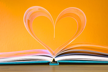 book page form heart in close-up photography thumbnail