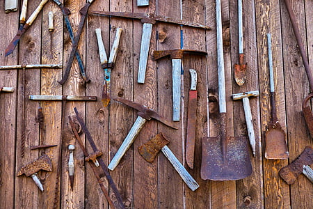 assorted gardening tools on brown surface thumbnail