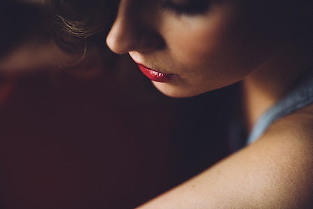 woman wearing blue sleeveless top thumbnail