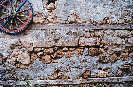 red, blue, and yellow wooden wheel thumbnail
