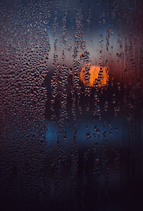 clear glass with moist thumbnail