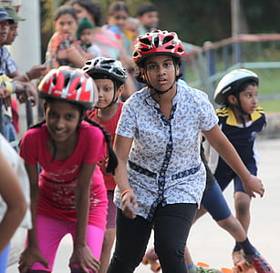 girls skating with roller skates during daytime thumbnail