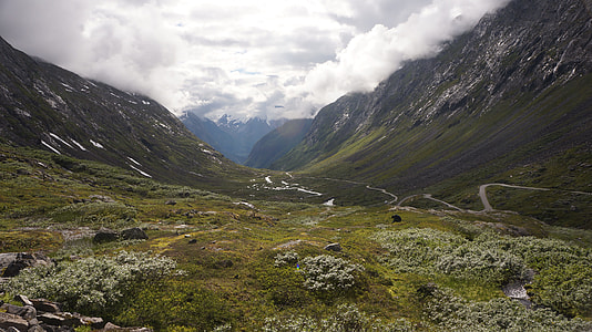 green mountains under white clouds during daytime thumbnail
