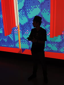 man standing in front of screen thumbnail