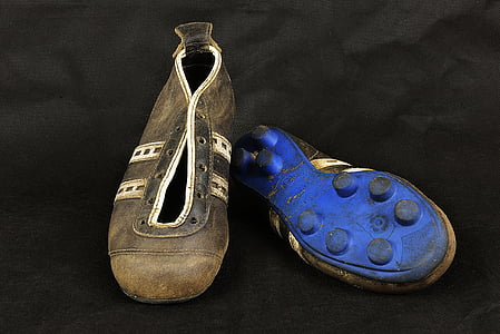 pair of black-and-white leather cleats thumbnail