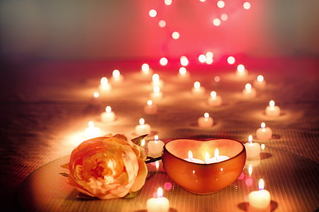 depth of field photography of romantic candle arrangement thumbnail