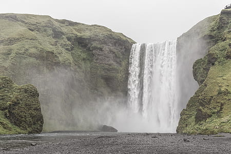 waterfalls during daytime thumbnail