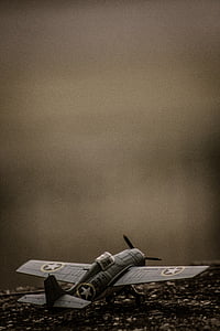 grey single-propeller plane photo thumbnail