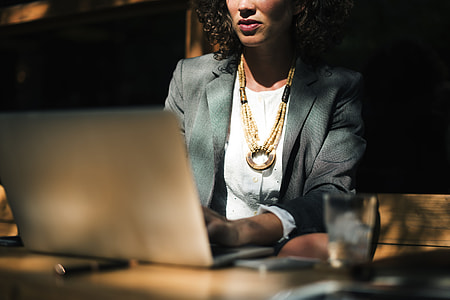 woman playing laptop computer thumbnail