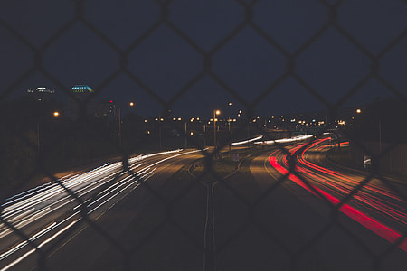 timelapse photography of vehicle lights on road thumbnail