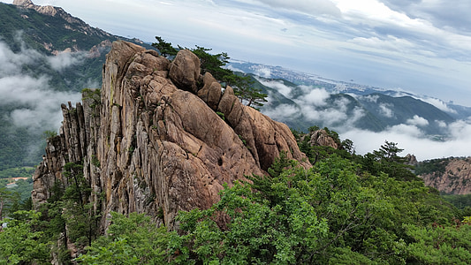 brown mountain cliff aerial photography thumbnail