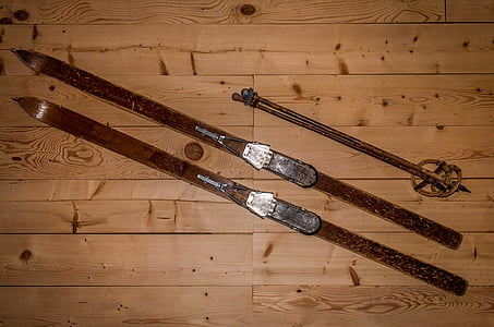 pair of brown ski-blades on pallet floor thumbnail
