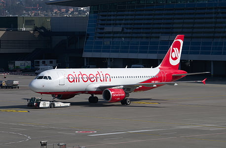 red and white Airberlin airliner thumbnail