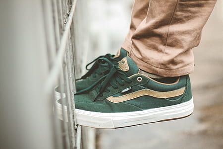 person wearing green Vans sneakers thumbnail