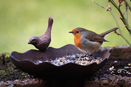 brown bird statuette thumbnail