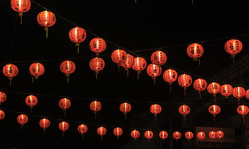 low angle photo of lighted Chinese lanterns thumbnail