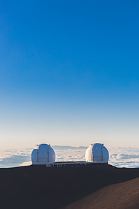 photo of white dome building near cliff thumbnail