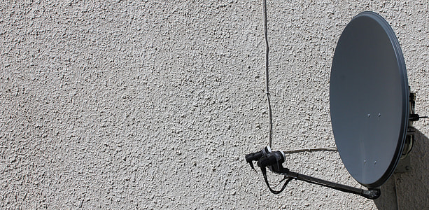 black satellite dish antenna on wall during daytime thumbnail