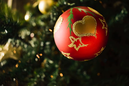 focus photo of red and gold bauble thumbnail