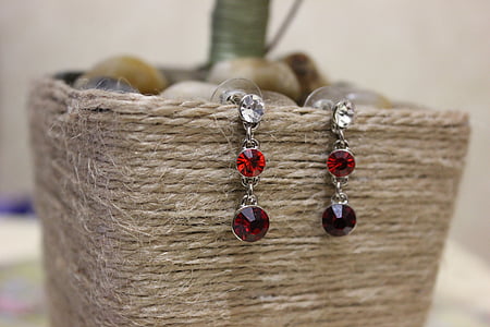 pair of silver-colored earrings thumbnail