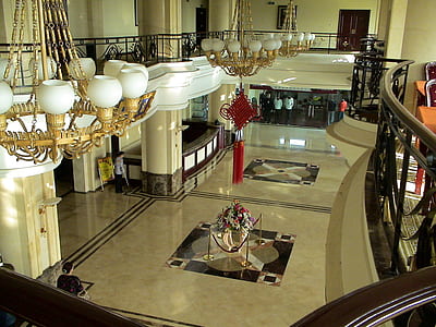 white and brass-colored uplight chandelier thumbnail