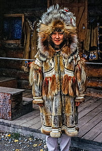 Young american woman in the traditional fur clothing of her native tribe thumbnail