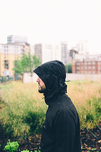 side view of man in black windbreaker jacket thumbnail