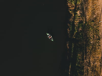 Person Riding Boat thumbnail