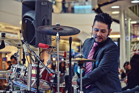 Man Playing Drum Inside Mall thumbnail