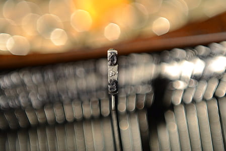 bokeh photography of piano key thumbnail