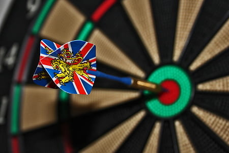 shallow focus photography of dart in bullseye thumbnail