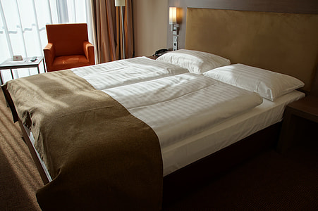 white bedding set near window thumbnail