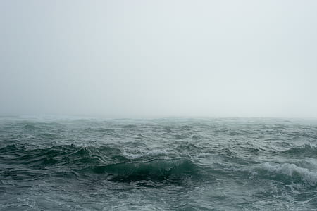ocean waves under white smoke photo thumbnail