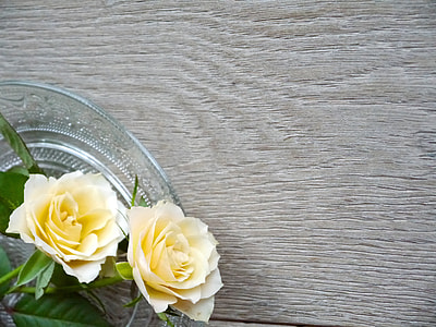 yellow rose flowers on brown wooden surface thumbnail