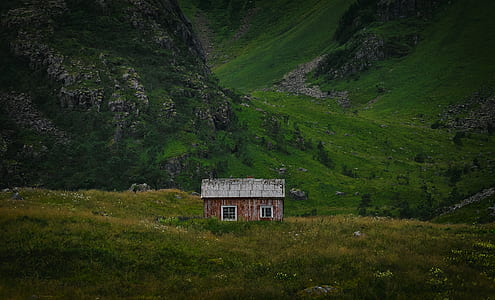 brown house on top of mountain thumbnail
