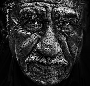close up photo of man's face thumbnail