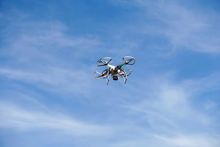 white and gray drone flying thumbnail