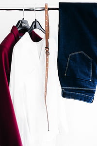 brown leather belt and blue jeans thumbnail