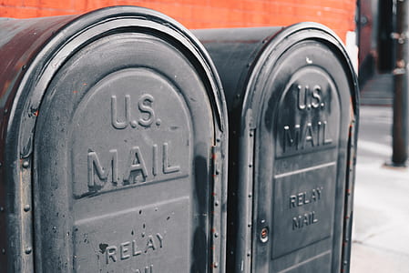 two black U.S. Mail boxes thumbnail