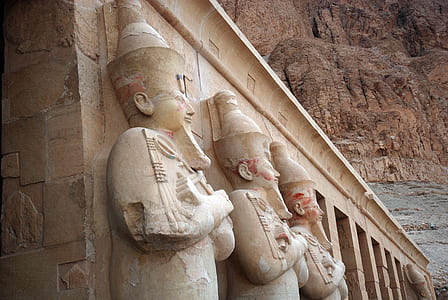 beige ceramic statues during daytime thumbnail