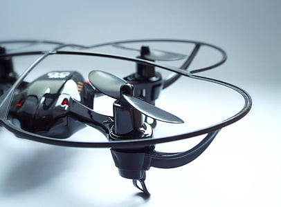 macro shot photography of black quadcopter thumbnail
