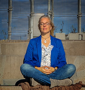 woman doing yoga during daytime thumbnail