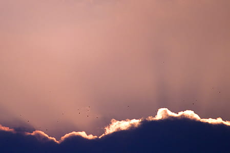 sunray over clouds photography thumbnail