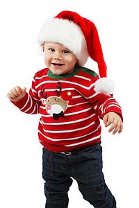boy wearing red and white Santa cap thumbnail