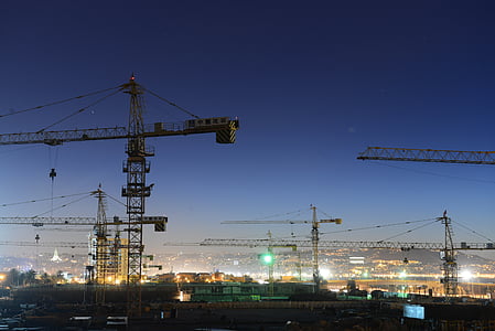 cranes at night time thumbnail