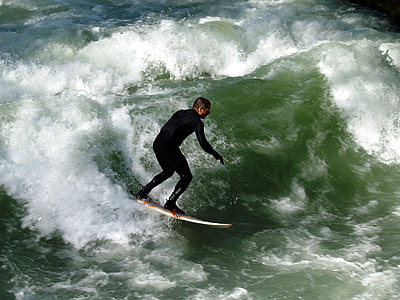 man surfboarding on sea thumbnail