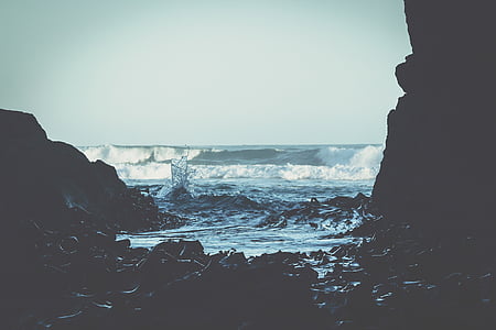 rock formation near ocean at daytime thumbnail