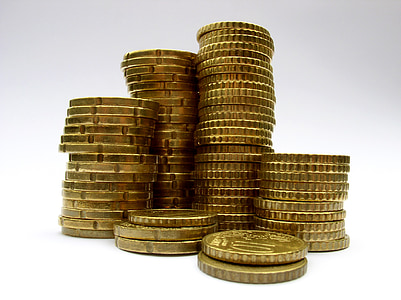 stacks of gold-colored coins thumbnail