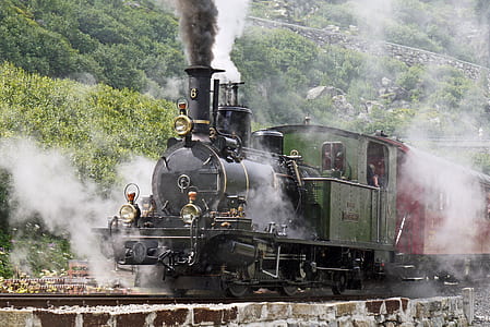 black, green, and red steam train thumbnail